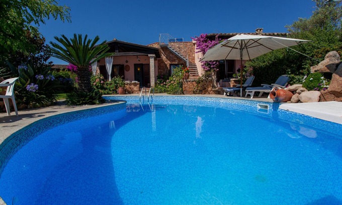 Luddui Villa | "Villetta Le Rose" con vistas al mar, piscina, Wi-Fi, jardín y terrazas