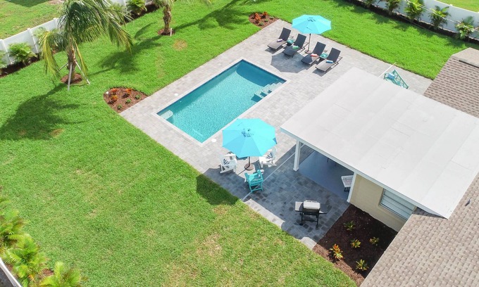 Shore Acre Heights Casa | Viva La Flamingo! Newly Furnished Home, 10 Min to Anna Maria, Heated Pool