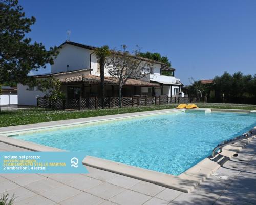 Sirolo Apartamento | VIVA2 - Numana, quadrilocale in villa con piscina