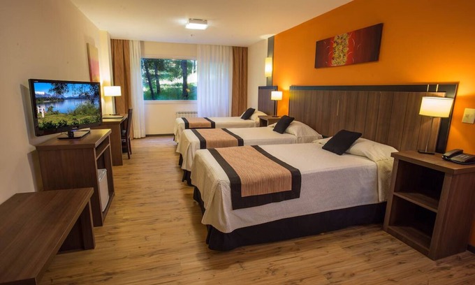 San Carlos de Bariloche Hotel | Wake to Breathtaking Garden Views Near City Center, Steps from Nahuel Huapi Lake