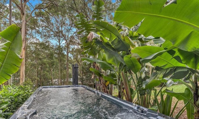 Murrays Beach Casa | Wallarah Forest Stay - heated swim spa and resort style grounds