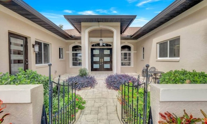 Cape Coral Casa | Wally's Fairway To Haven: Discover Your Paradise: Rental with Lake View, Pool, and Golf Access!