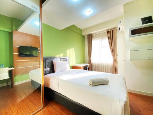 Cileunyi Apartamento | Warm Studio Apartment at Harvard Jatinangor By Travelio