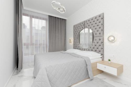 Wilanow Apartamento | Warsaw Sarmacka Apartment with Gym, Sauna and Parking by Noclegi Renters