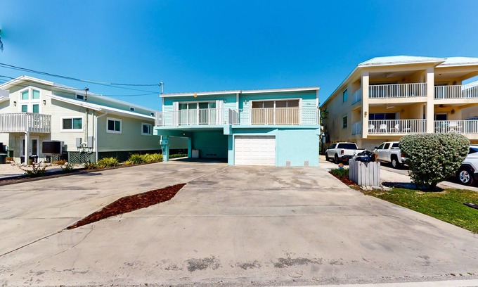 Key Colony Beach Casa | Waterfront duplex with canal access & Cabana Club pool membership