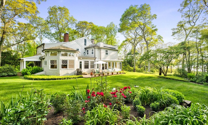 Wainscott Casa | WATERFRONT GEORGICA POND AND BOATHOUSE