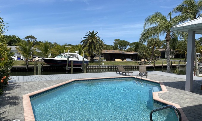Silver Shores Casa | Waterfront Island Pool Home, Walk to Beach, dock your boat includes boat lift
