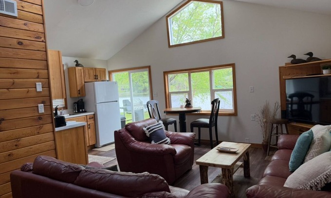 Eau Claire Casa | Waterfront legacy farm cottage house with WiFi, AC in lovely Eau Claire