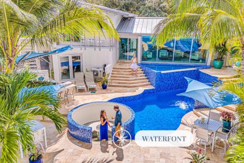Riverside Park Casa | Waterfront Oasis Cascading Pool Views Centrally located Heated Pool Cascade KeyResidences