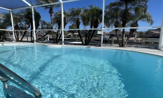 Flor-a-mar Casa | Waterfront, Pool, Dock,Local Boat Rental for Islands, Golf, Beaches 1K/2Q/2