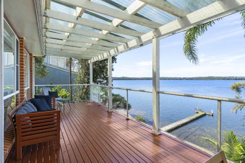 Sunshine Casa | Waterfront Vista Escape with Games Room Jetty Access & Expansive Views