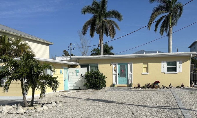 South Island Casa | WE ARE BACK! NEWER POOL/SPA and Walk to beach! Totally updated Canal front home!