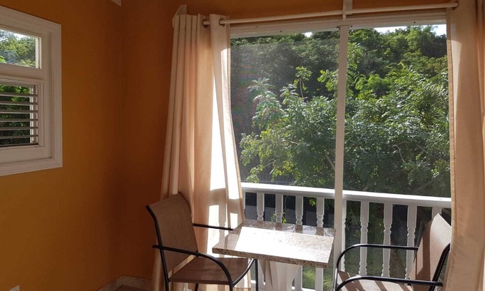 Cades Bay Cabaña | Bienvenido a Avignon Cottage