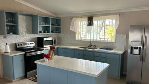 Callendar Casa | Welcome to Hope Winds, a charming property ranch-style house on a seren