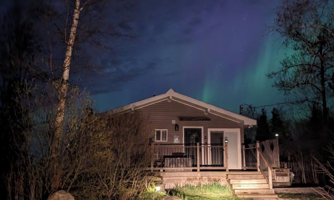 Tobermory Casa | Welcome to Sunset Cove — a serene waterfront cottage near Tobermory, where turquoise waters meet star-filled skies. Enjoy sunsets, Northern Lights, a private dock, and cozy nights by the fire. Your unforgettable escape awaits.