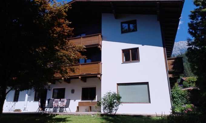 Scheffau am Wilden Kaiser Apartamento | Well-equipped vacation apartment with fireplace for 8 (+2) people