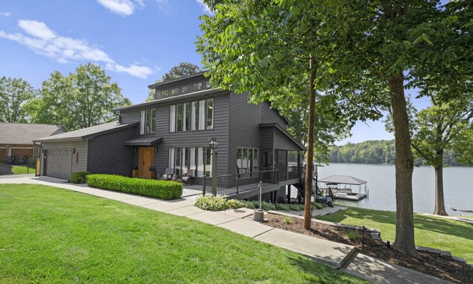 Mooresville Villa | Whiskey Sunsets: Stunning Peninsula Retreat with Panoramic Lake Views, Dock, Hot Tub, and More!