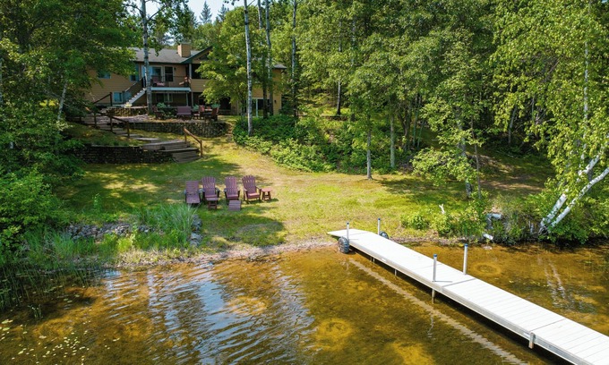 Spooner Casa | Whispering Woods- Spacious 5 bedroom home with sandy frontage near Spooner, WI.