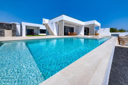 Puerto Calero Villa | White House - Fire pit and Private pool By Lanzarote Vacation Homes
