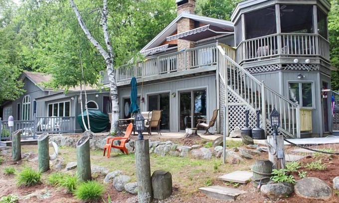 Moultonborough Casa | Winnipesaukee Waterfront Home sleeping 12 dock and sandy beach