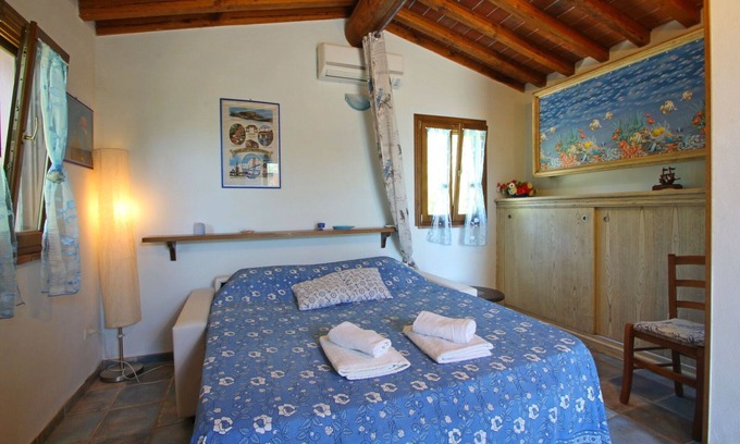 Castiglione della Pescaia Casa | Casa de vacaciones privada con jacuzzi, A/C, TV, veranda, vista panorámica, aparcamiento