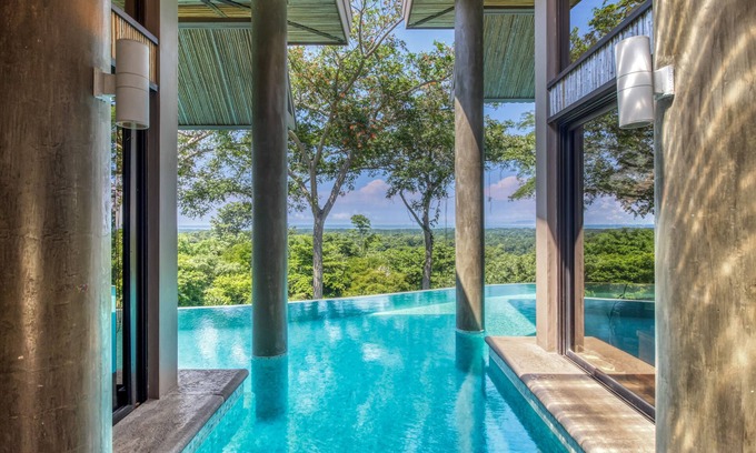 Tárcoles Casa | Maravillosa casa para perros rodeada de naturaleza con vistas al océano y piscina privada