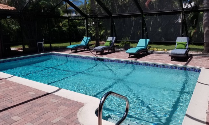 Marco Island Casa | Maravillosa casa con piscina y jardín, a poca distancia, bicicleta o caminar a la playa.