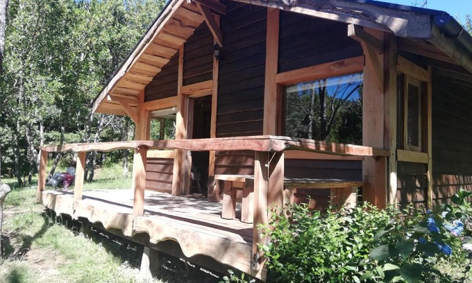 Pucon Casa | Wonderful rustic cabin 2, with native logs, on the banks of the Trancura River