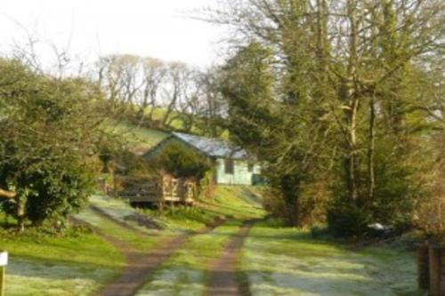 Burgh Island Chalet De Esquí | Woodcutters Lodge set in a secluded valley near Bantham