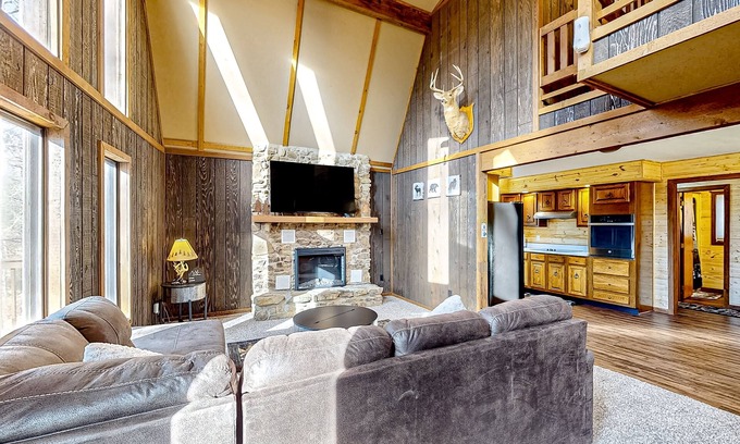 Gnaw Bone Casa | Wooded acreage with wrap-around deck, hot tub, central AC, & game room