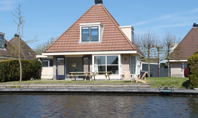 Indijk Villa | Woudsend: Casa familiar de lujo para 8 personas. en el agua!
