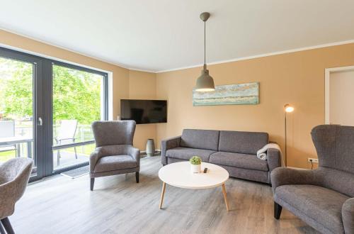 Krakow am See Apartamento | Yogasutra - Stilvolles 3-Zimmer-Apartment mit Seeblick, Balkon & Sauna