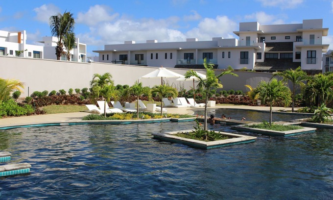 Roches Noires Apartamento | Su apartamento con vistas al mar
