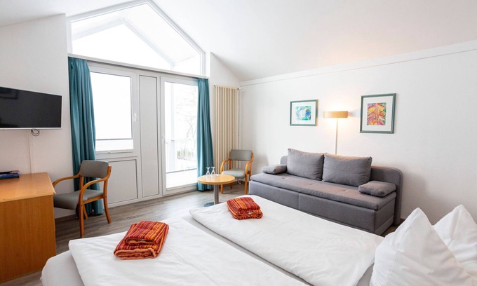 Lubmin Casa | Zimmer Stammhaus seitlicher Meerblick - Hotel Seebrücke