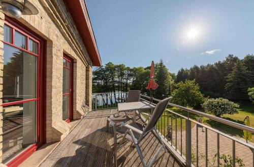 Muritz Apartamento | Zwergtaucher - Ferienwohnung mit Balkon, Seeblick & Freizeitangeboten am See