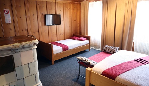Habitación superior con 1 cama doble o 2 individuales
