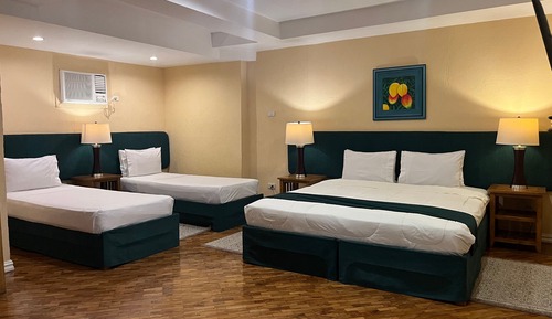 Habitación cuádruple ejecutiva