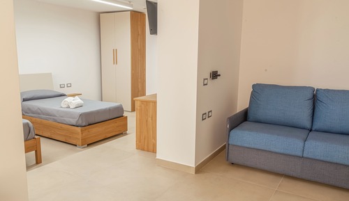 Habitación familiar, varias camas