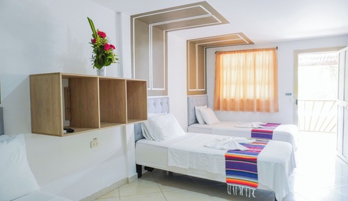 Habitación familiar, varias camas