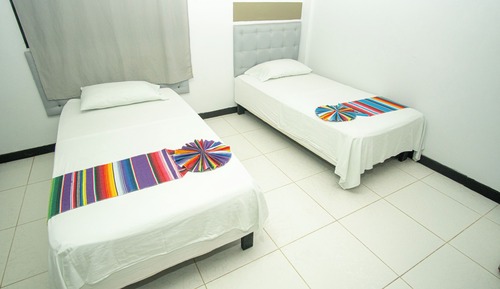 Habitación superior, varias camas