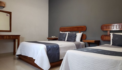 Habitación superior, varias camas