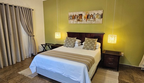 Habitación Deluxe con 1 cama doble o 2 individuales, 1 habitación, patio, vistas al jardín