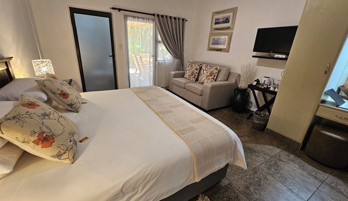 Habitación Deluxe con 1 cama doble o 2 individuales, 1 habitación, patio, vistas al jardín