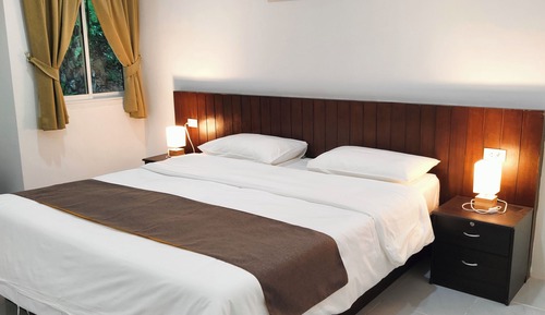 Habitación junior con 1 cama doble o 2 individuales