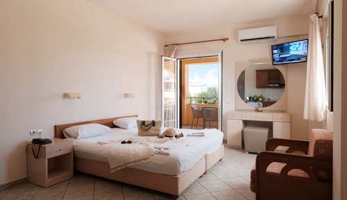 Habitación triple estándar, vistas al jardín