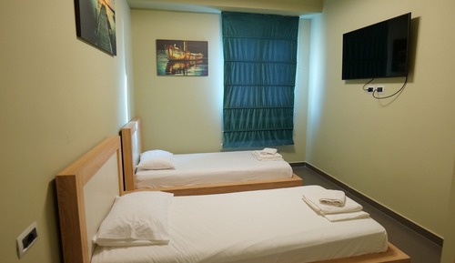 Habitación con 2 camas individuales