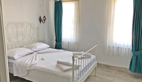 Habitación cuádruple Deluxe, vistas al jardín
