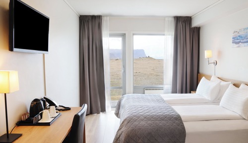 Habitación estándar con 1 cama doble o 2 individuales