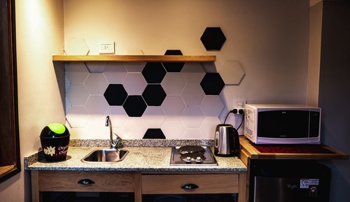 Habitación estándar con 1 cama doble o 2 individuales, cocina básica