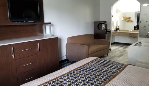 Suite estándar, 1 cama de matrimonio grande, bañera de hidromasaje